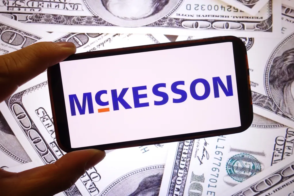 mckesson logo on a background featuring cash notes